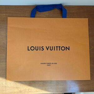 Medium Louis Vuitton bag! 16x9x20.5 inches.